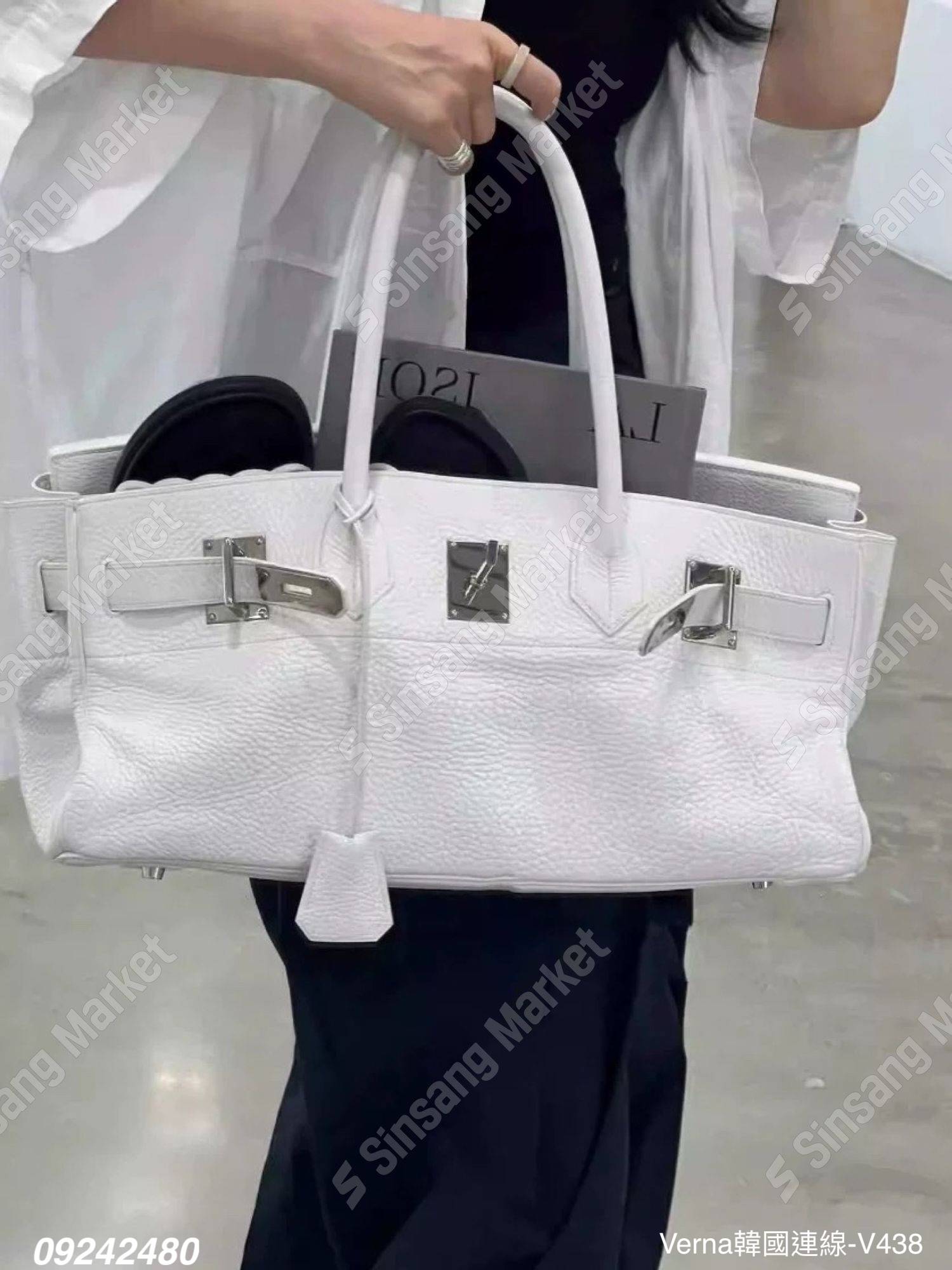 亮麗荔枝壓紋手提包